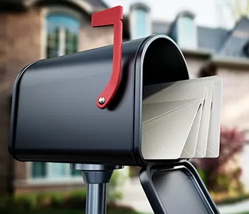 mailbox with mail overflowing